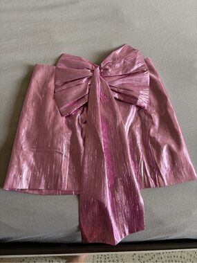 Shimmery Pink Mini Skirt with Oversized Bow Accent